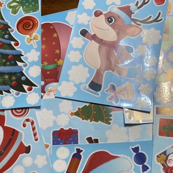 Christmas window clings.  12 in package. All different designs.  New. - Picture 2 of 7